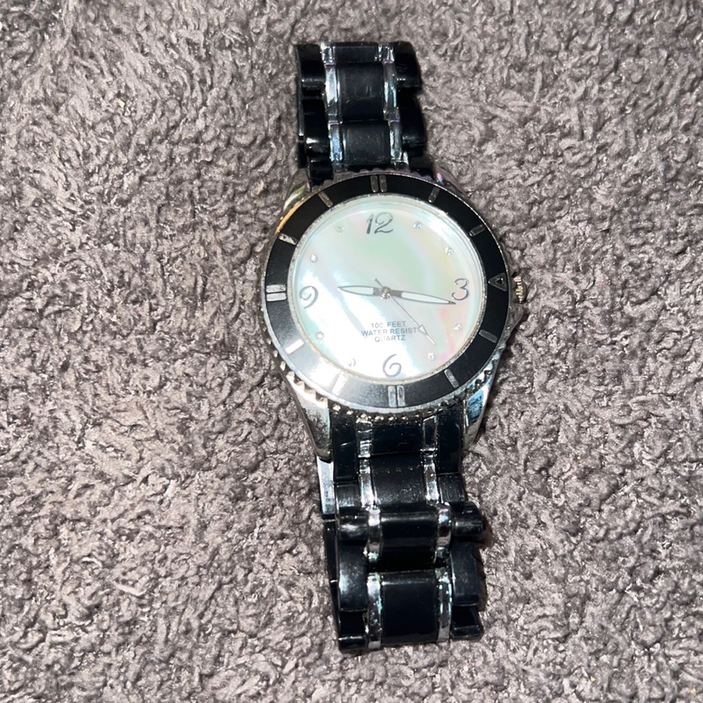 Beautiful black and quartz watch